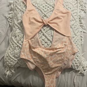 Swimming suit pink color something blue XXS !! New with not tag.